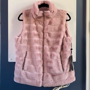 Charlie B Women's Reversible Puffer Vest in pink.